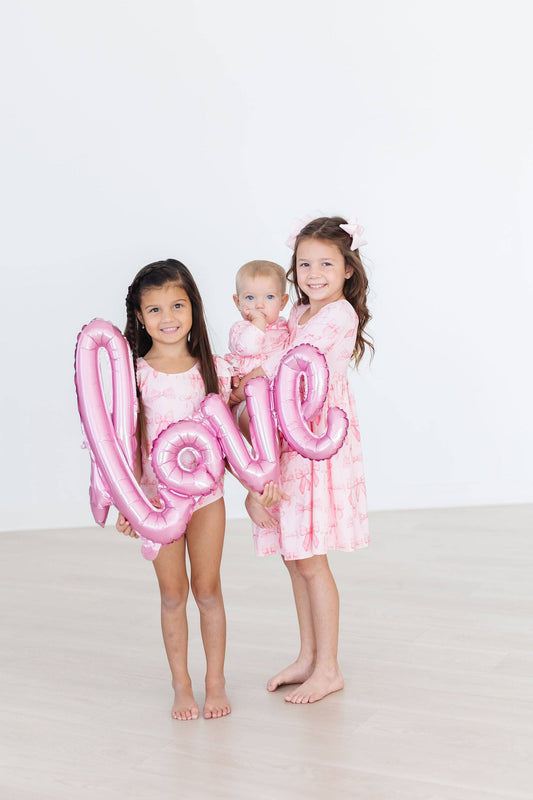 Blushing Bows Twirl Bodysuit